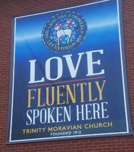 Banner reads "Love Fluently Spoken Here"